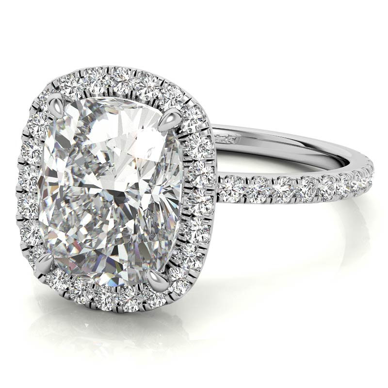 This beautiful Moissanite engagement ring features a halo design, a rectang...